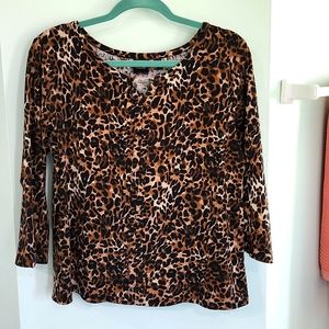 Rafaella 3/4 sleeve leopard print top with gold bar detail at neckline .